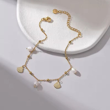 quality shell pearl bracelet stainless steel plated in gold