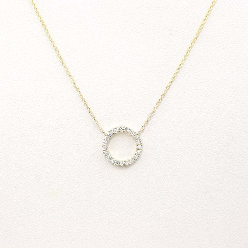circular ring with diamond inlay and bangle chain for the collarbone