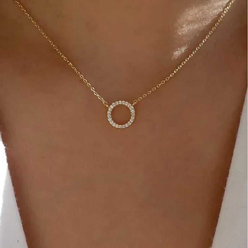 circular ring with diamond inlay and bangle chain for the collarbone
