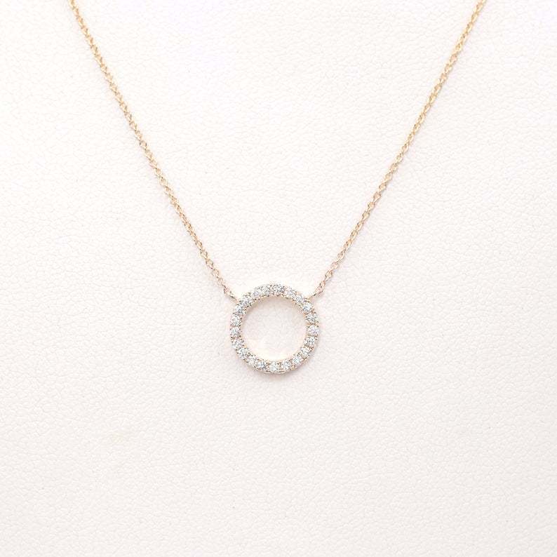 circular ring with diamond inlay and bangle chain for the collarbone